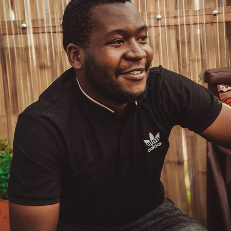 Kaveri Mehta, Lead Design Curator at Modern Value Architecture, reviewing corporate floral arrangements